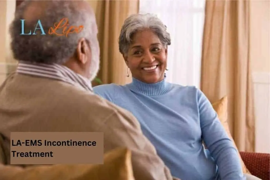 Couple sat smiling at each other - LA-EMS treatment Lymington
