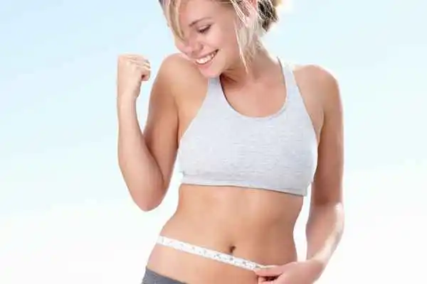 woman happy after fat reduction treatment Lymington