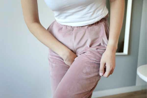 older woman running to the toilet because of urinary incontinence Lymington