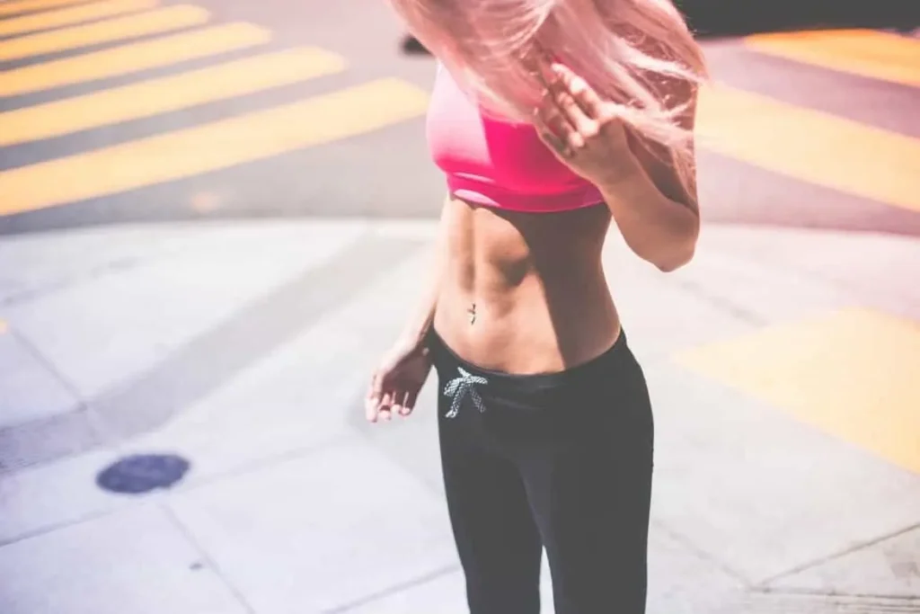 Woman with toned stomach after LA-EMS Body Sculpting Treatment Lymington